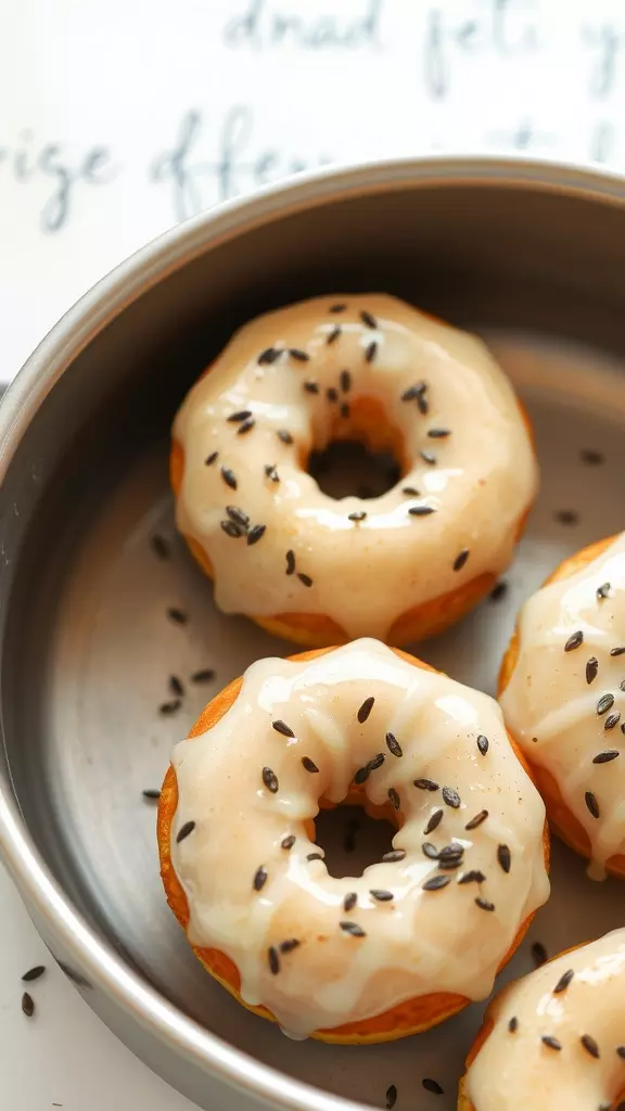 Baked lemon poppy seed doughnuts with glaze and poppy seeds on top